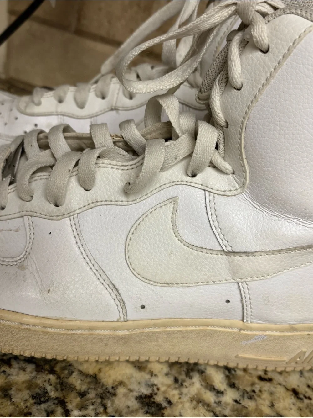 Nike White High-Top Sneakers with Cream Sole